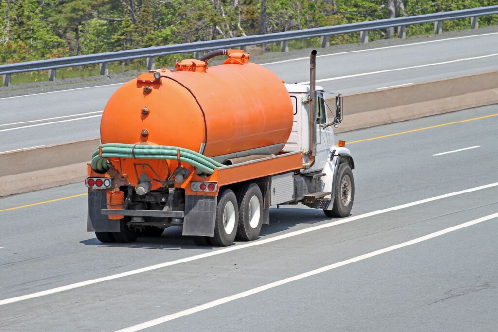 Sewage Septic Truck driving down the road