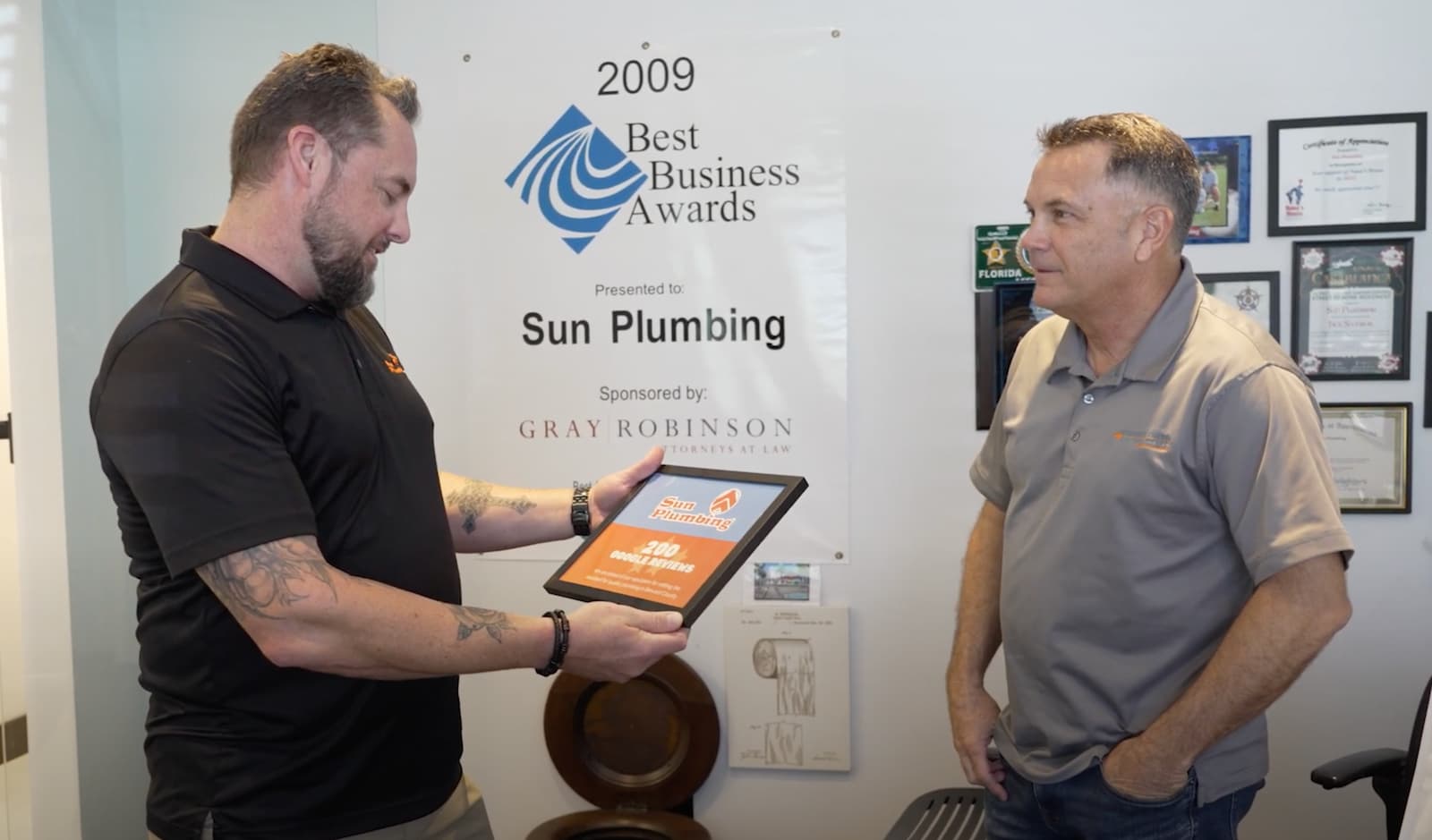 sun plumbing is presented a google 200 certificate from Mark Lewis of Tight Line Productions